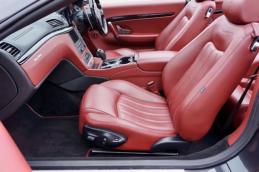 Auto Interiors: Cloth Or Leather